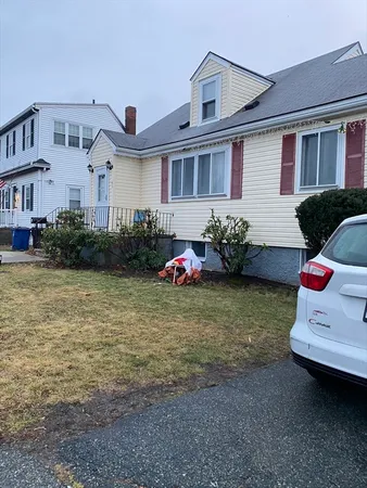 a view of a house with a street