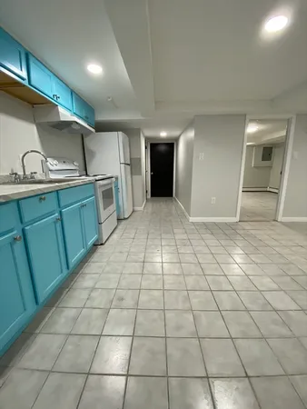 a view of a kitchen with a sink
