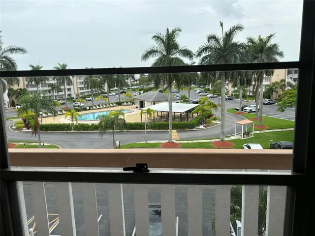 a view of a street from a balcony