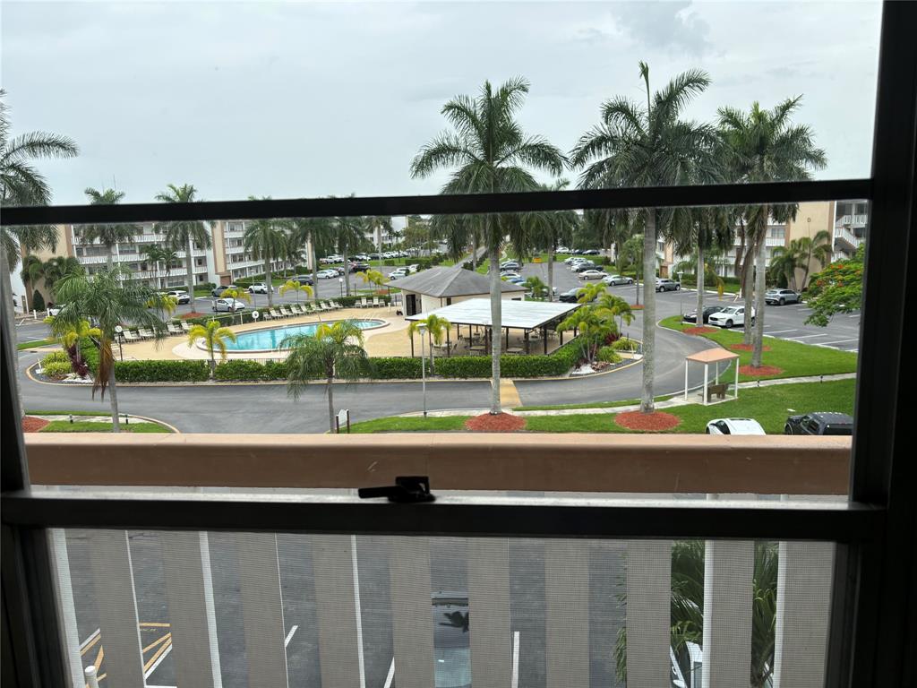 4053 Cornwall C, Unit 4053 Boca Raton, FL 33434 - Photo 12 of 12 a view of a street from a balcony