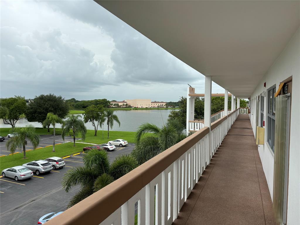 4053 Cornwall C, Unit 4053 Boca Raton, FL 33434 - Photo 2 of 12 a view of a city from a balcony