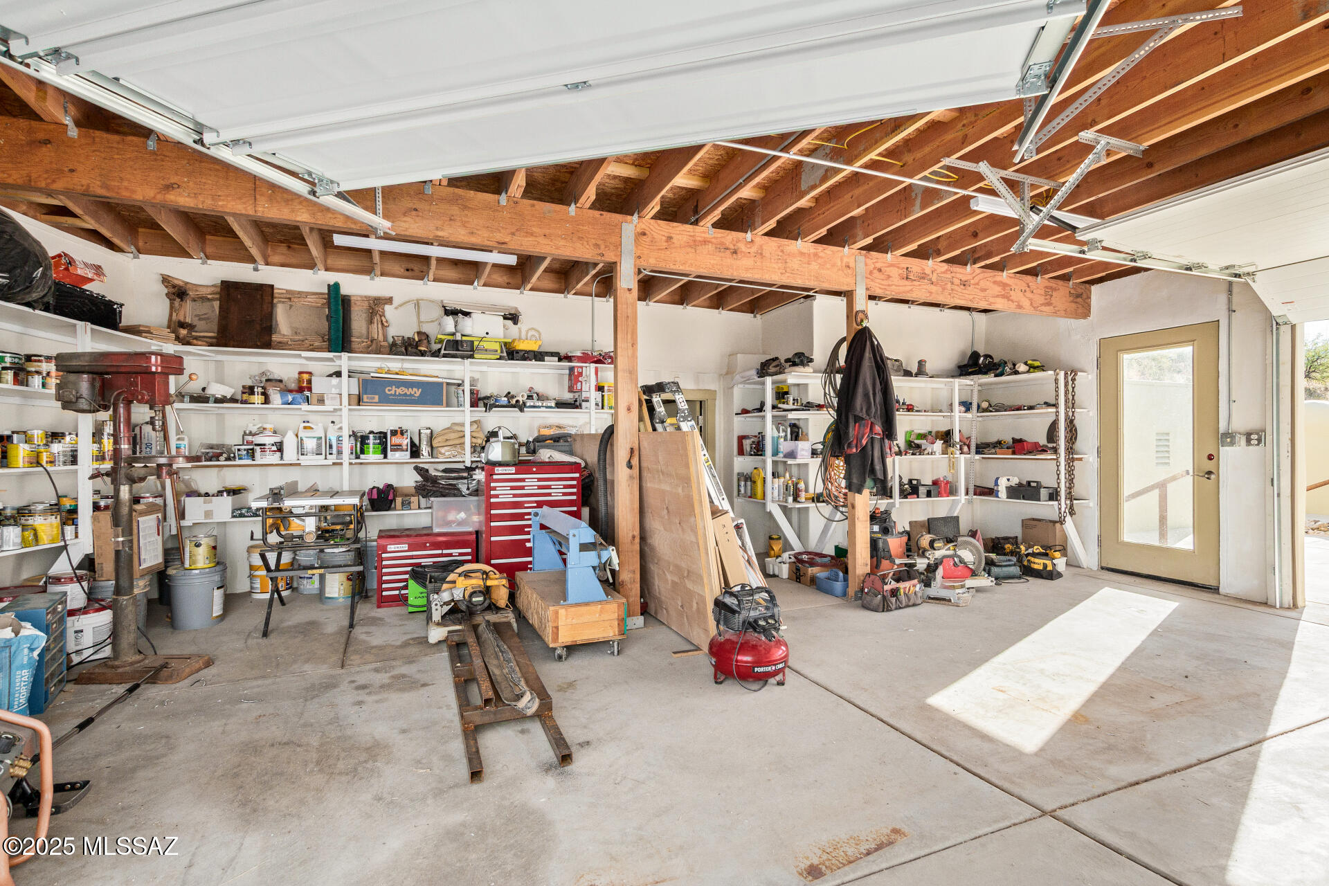 8491 South Pistol Hill Road Vail, AZ 85641 - Photo 31 of 50 Garage with storage shelving