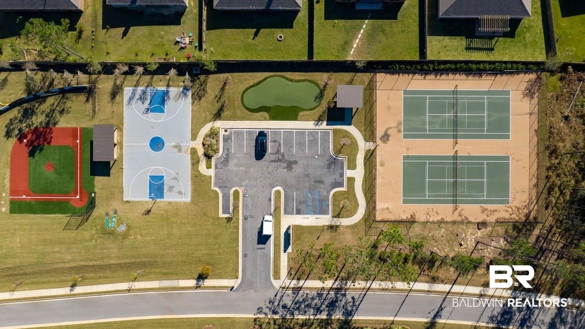 32125 Lyon Road Daphne, AL 36527 - Photo 64 of 70 Community amenities featuring two tennis courts, a basketball court, a baseball field, a putting green, and a parking area