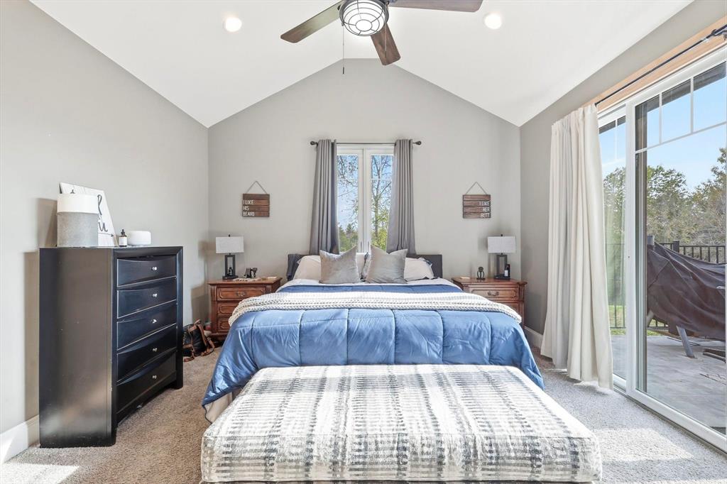 3300 Rigsby Lane Celina, TX 75009 - Photo 17 of 40 a bedroom with a large bed and a window