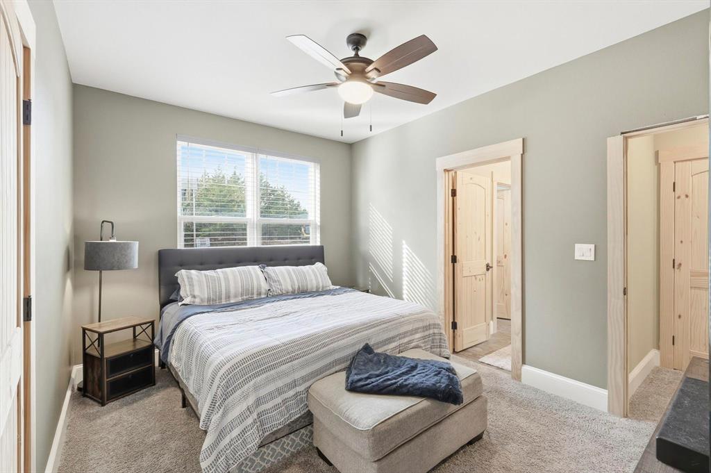 3300 Rigsby Lane Celina, TX 75009 - Photo 25 of 40 a bedroom with a bed and a ceiling fan