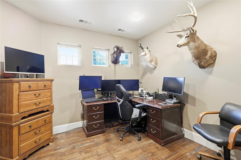 3300 Rigsby Lane Celina, TX 75009 - Photo 30 of 40 a view of a workspace with furniture