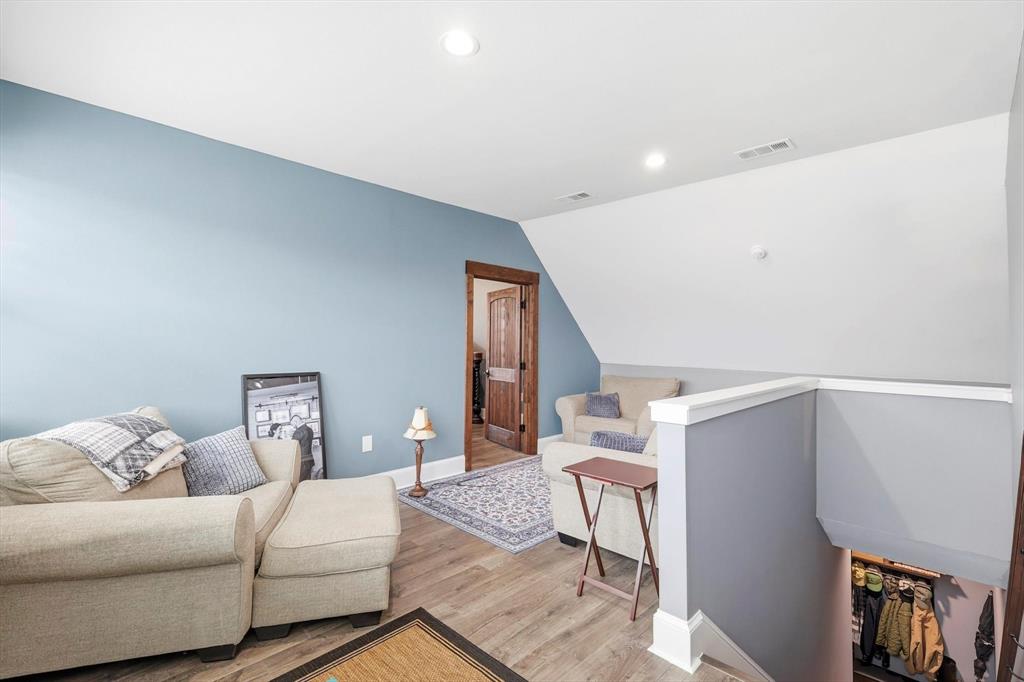 3300 Rigsby Lane Celina, TX 75009 - Photo 31 of 40 a living room with furniture and a couch