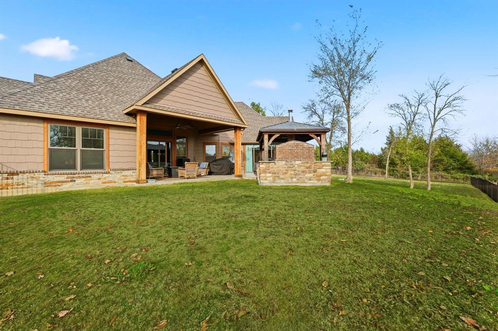 3300 Rigsby Lane Celina, TX 75009 - Photo 37 of 40 a front view of a house with garden