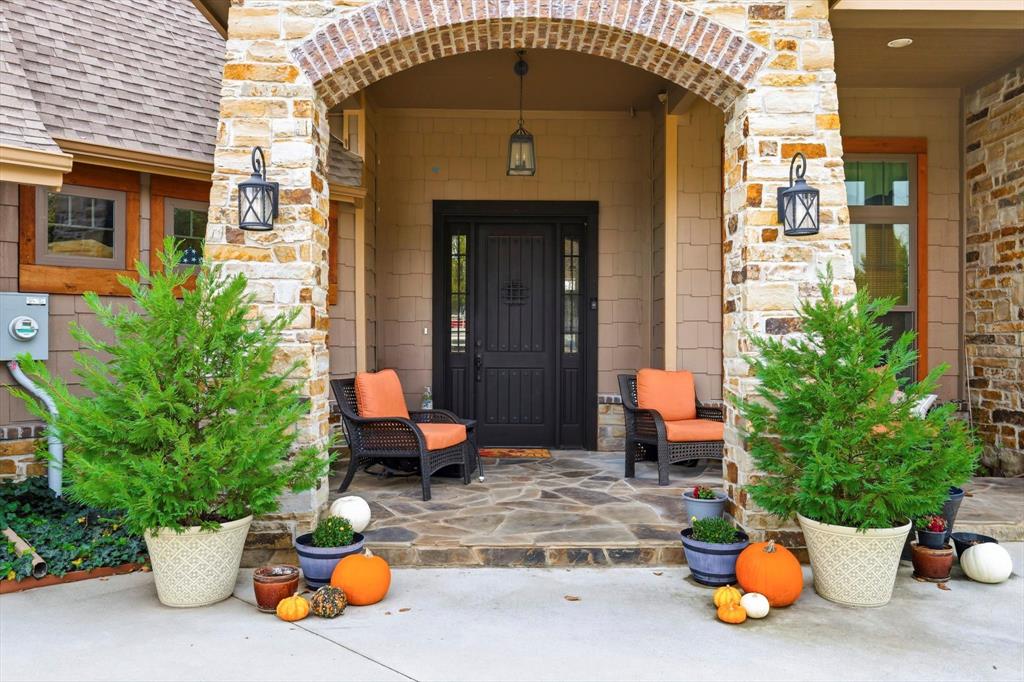 3300 Rigsby Lane Celina, TX 75009 - Photo 4 of 40 a front view of a house with outdoor seating
