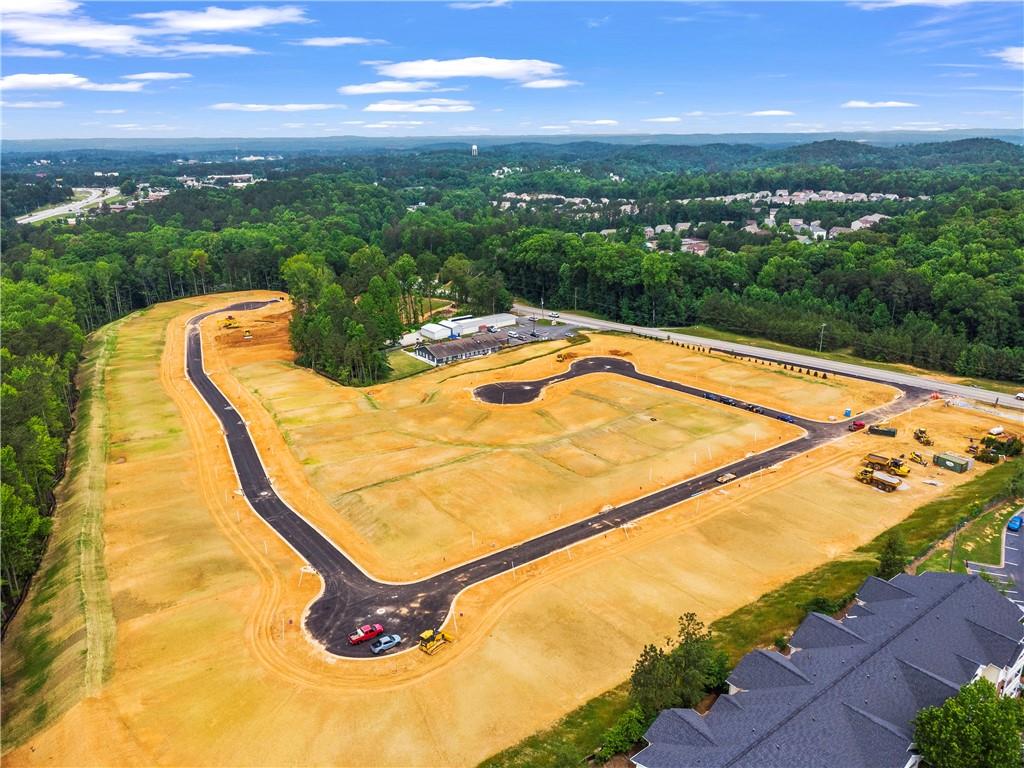 239 Sage Woods Way Dallas, GA 30132 - Photo 4 of 4 a view of a swimming pool with a patio and ocean view