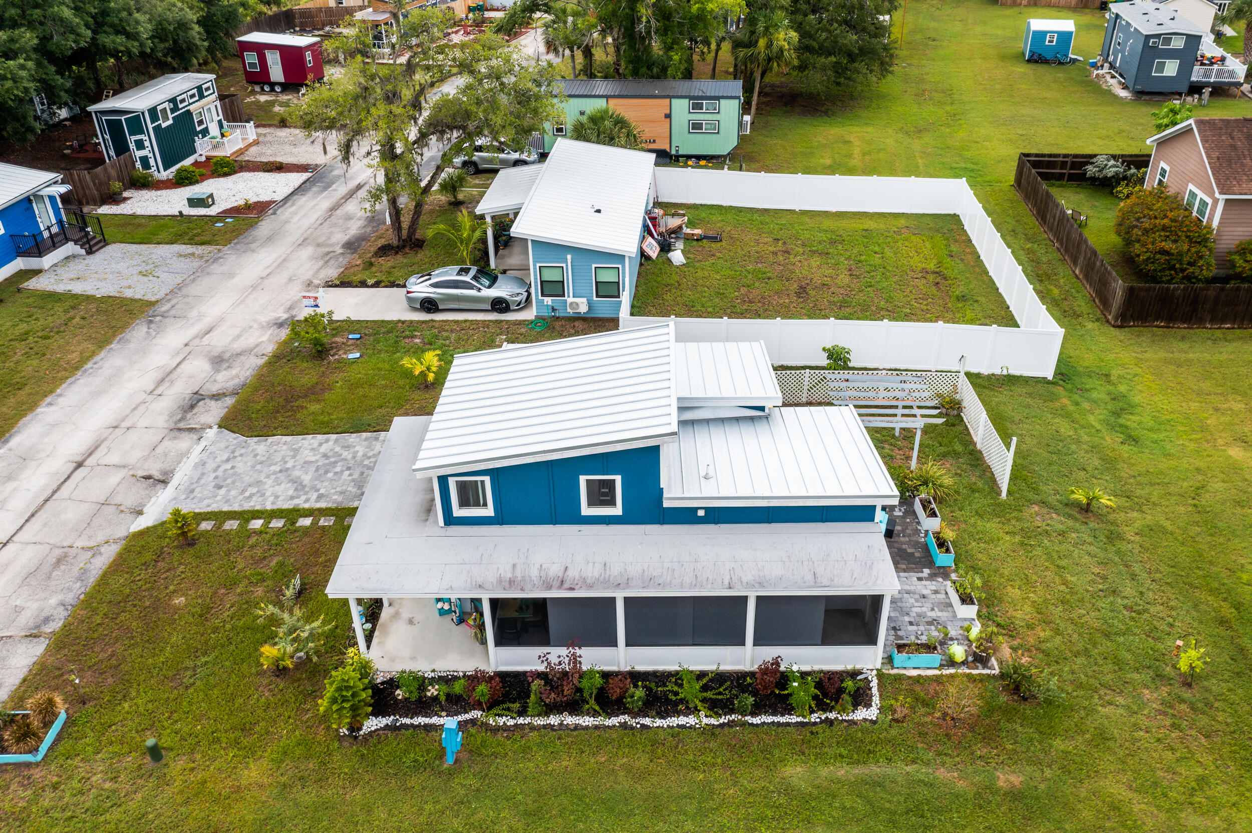 204 Flamingo Road Cocoa, FL 32926 - Photo 16 of 18 an aerial view of a house with swimming pool garden and patio