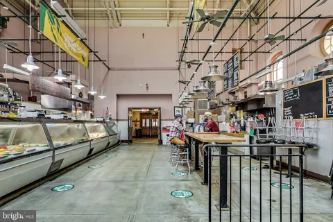 a view of a cars park in front of a building