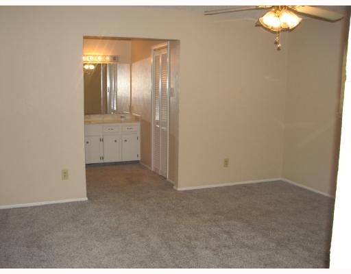 209 Oak Ridge Drive Corpus Christi, TX 78418 - Photo 4 of 5 an empty room with windows