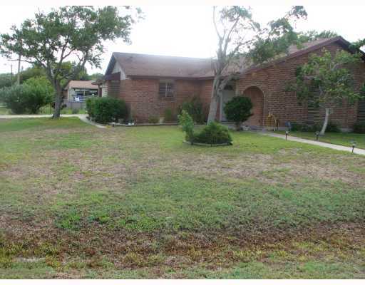 209 Oak Ridge Drive Corpus Christi, TX 78418 - Photo 5 of 5 a view of a house with a yard