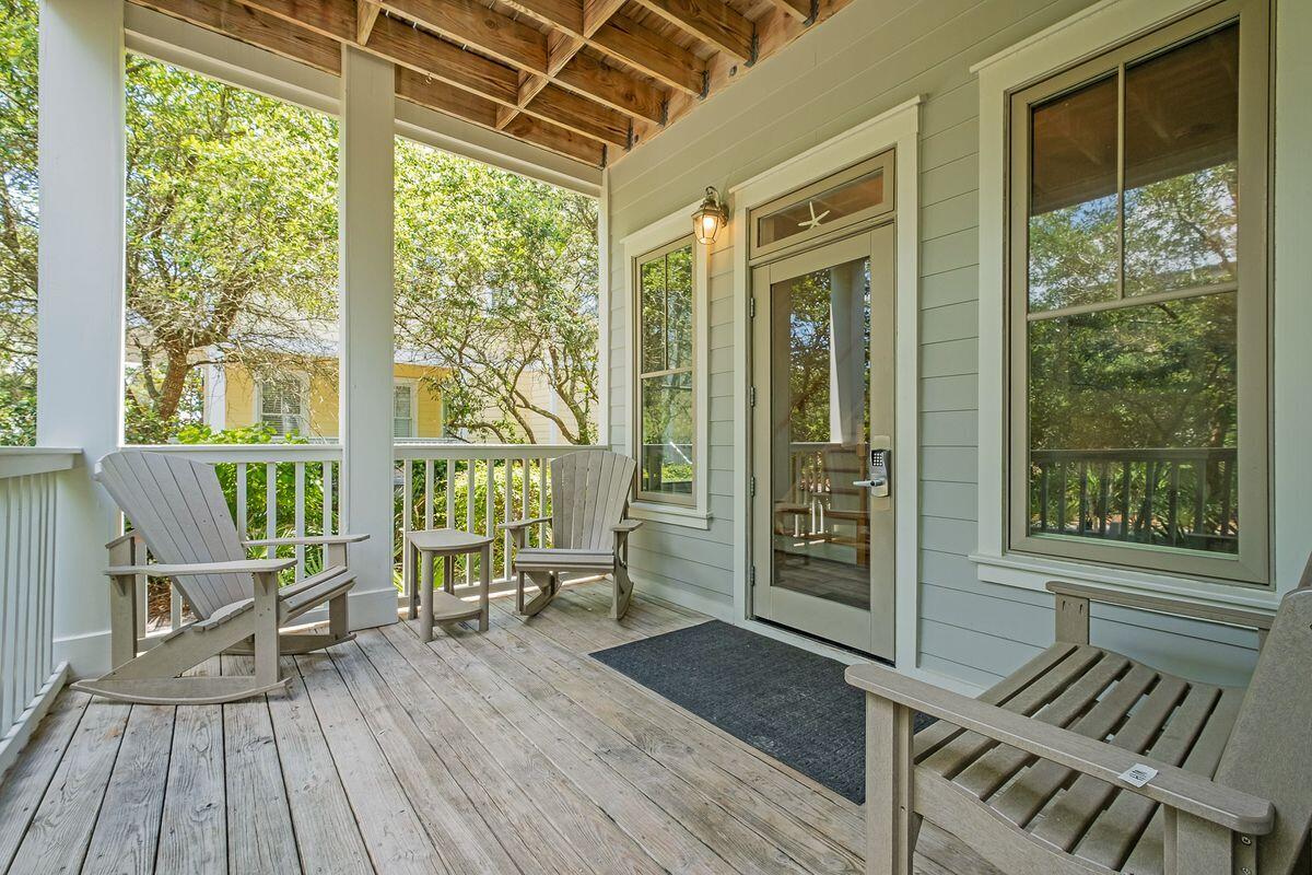 40 Chelsea Loop Road Santa Rosa Beach, FL 32459 - Photo 13 of 46 a balcony with wooden floor and outdoor space