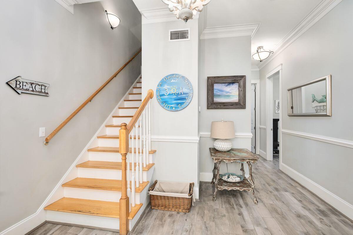 40 Chelsea Loop Road Santa Rosa Beach, FL 32459 - Photo 14 of 46 a view of entryway with wooden floor and workspace