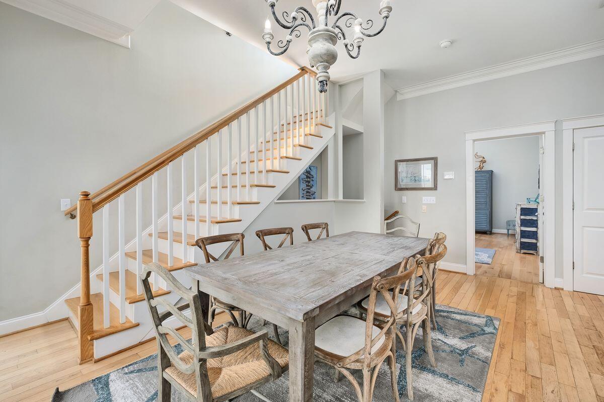 40 Chelsea Loop Road Santa Rosa Beach, FL 32459 - Photo 23 of 46 a view of a dining room with furniture and wooden floor