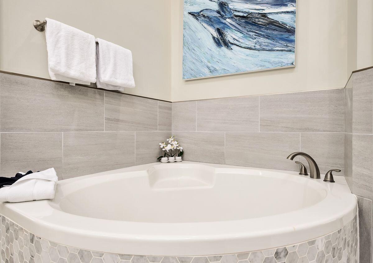 40 Chelsea Loop Road Santa Rosa Beach, FL 32459 - Photo 30 of 46 a white bath tub sitting in a bathroom