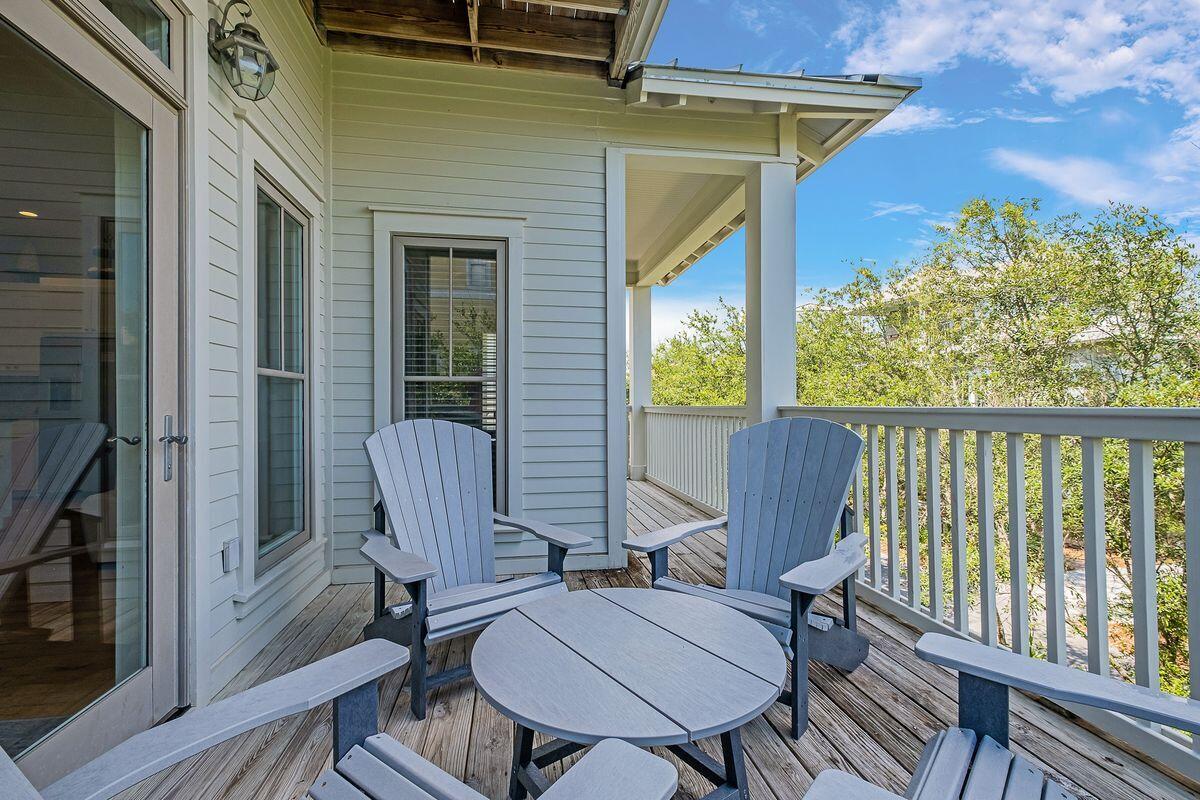 40 Chelsea Loop Road Santa Rosa Beach, FL 32459 - Photo 35 of 46 a view of a chair and table in the balcony