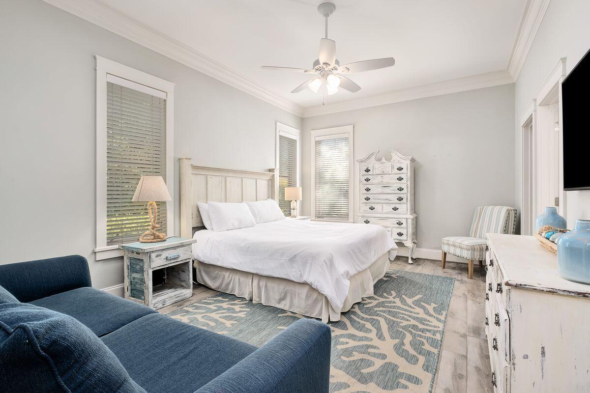 40 Chelsea Loop Road Santa Rosa Beach, FL 32459 - Photo 8 of 46 a bedroom with a bed a couch and dresser