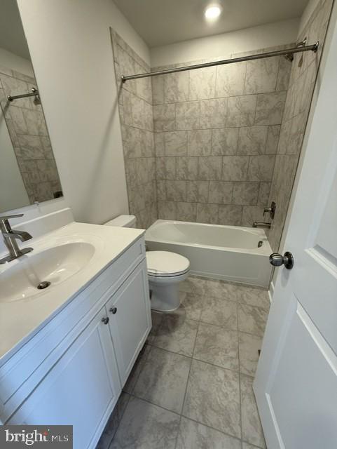 7608 River Reach Road Baltimore, MD 21244 - Photo 14 of 14 a bathroom with a sink a toilet and shower