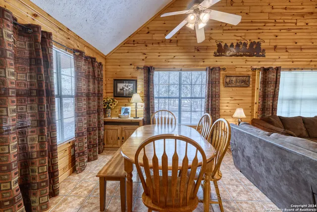 a view of a balcony with furniture