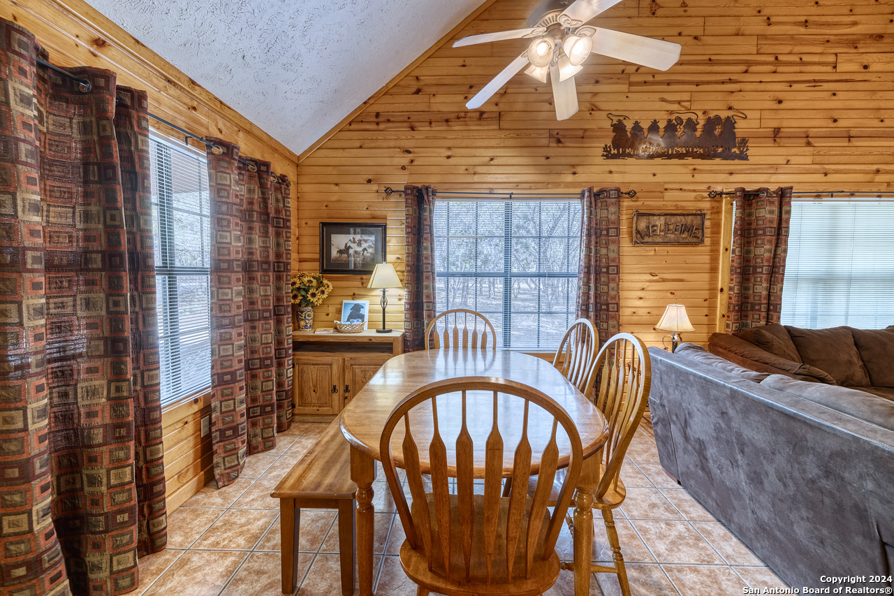 65 Comanche Crk Road Concan, TX 78838 - Photo 6 of 24 a view of a balcony with furniture