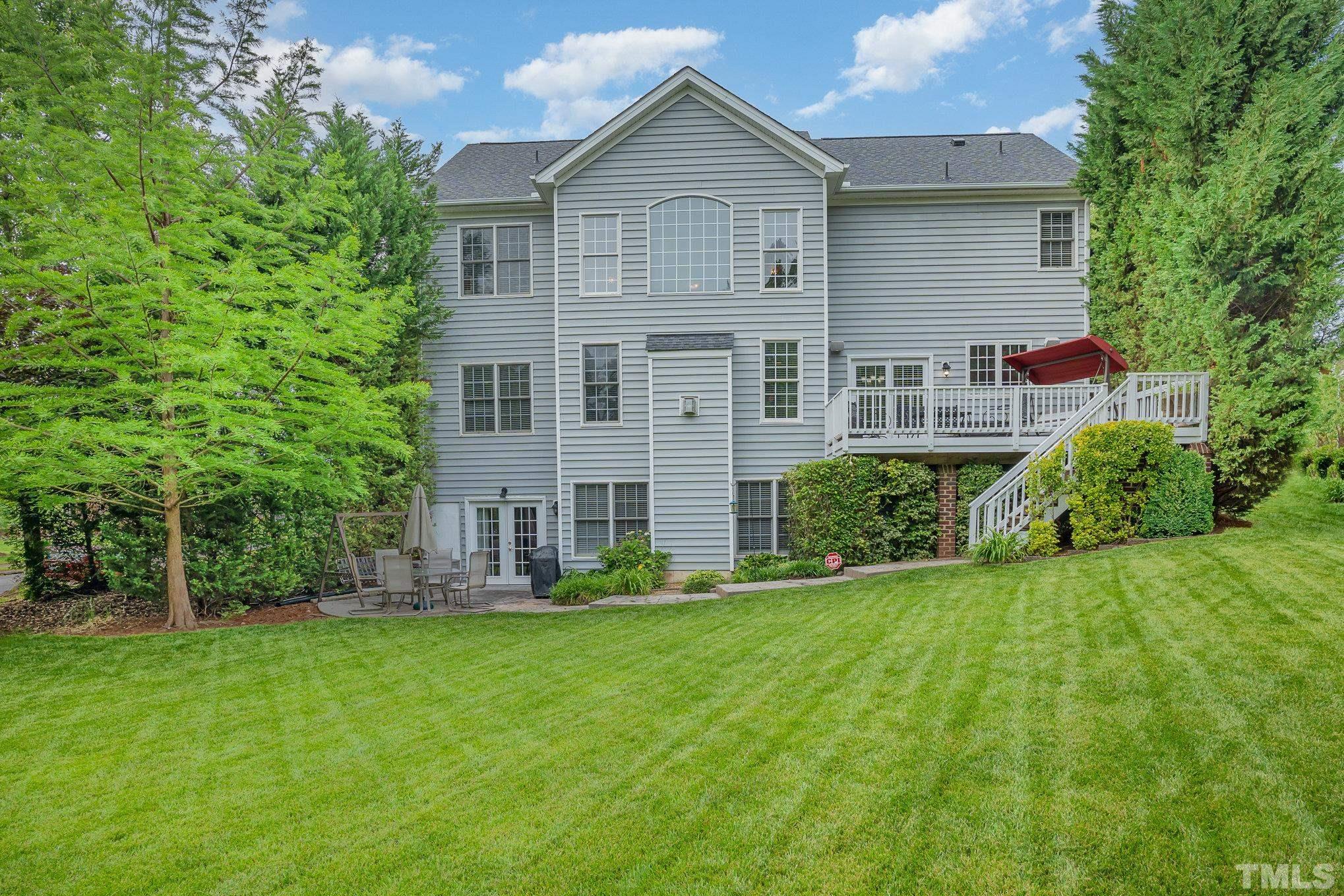 9300 Palm Bay Circle Raleigh, NC 27617 - Photo 25 of 30 a front view of house with yard and green space