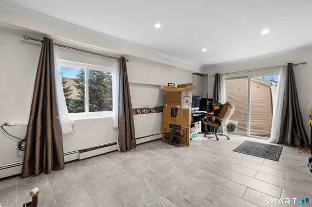 a view of a chairs and table on the deck