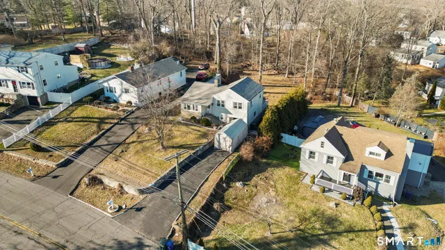 an aerial view of a city with lots of residential buildings