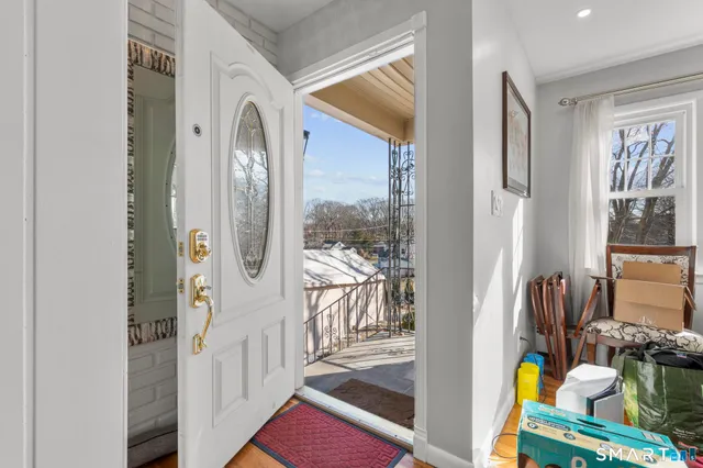 a living room with furniture or flat screen tv and a fireplace