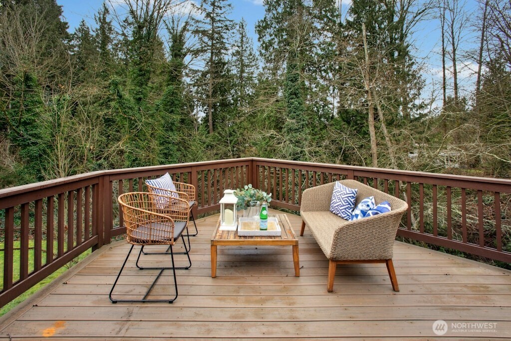 1104 204th Place Southeast Bothell, WA 98012 - Photo 11 of 30 a view of sitting area with furniture and wooden floor
