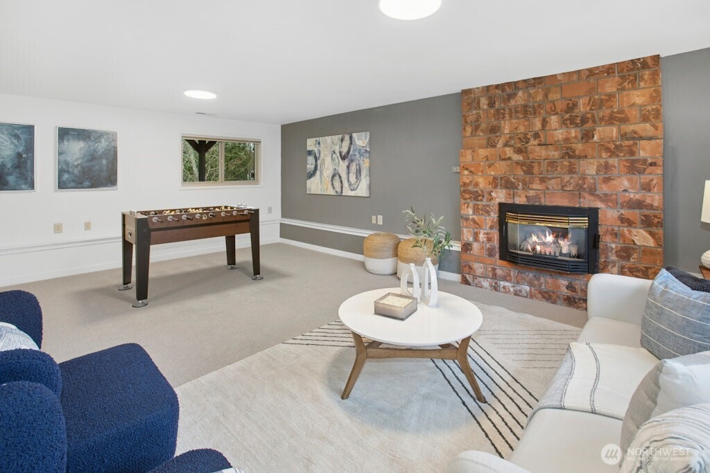 1104 204th Place Southeast Bothell, WA 98012 - Photo 21 of 30 a living room with furniture and a wooden floor