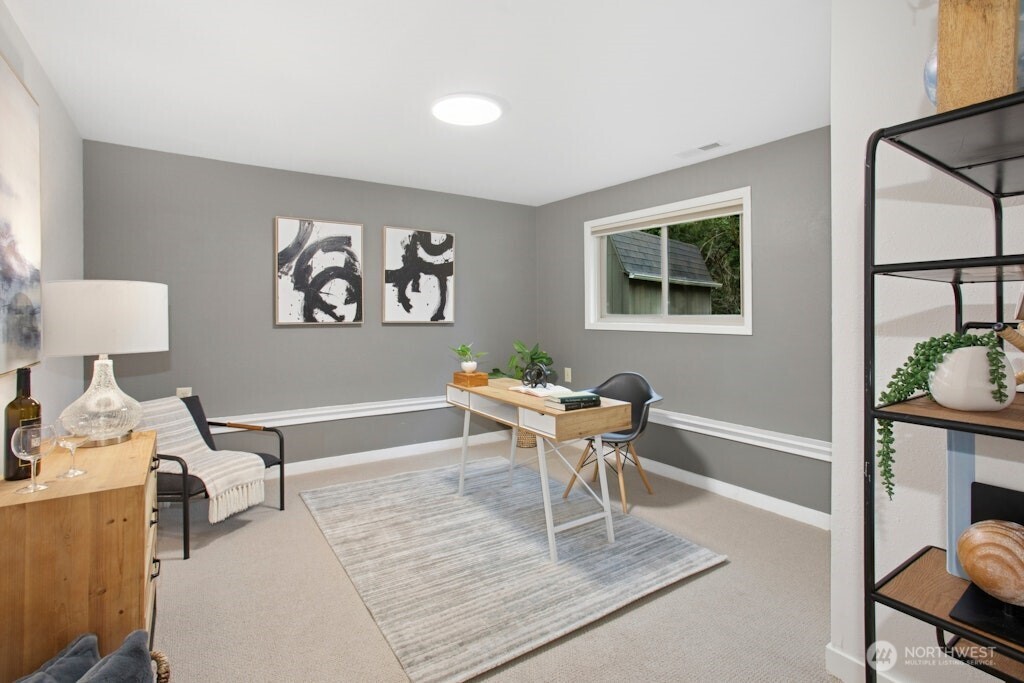 1104 204th Place Southeast Bothell, WA 98012 - Photo 23 of 30 a work room with furniture and a window