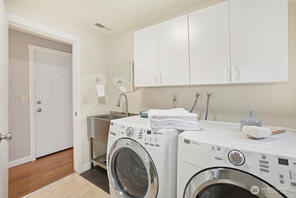 1104 204th Place Southeast Bothell, WA 98012 - Photo 25 of 30 a utility room with dryer and washer