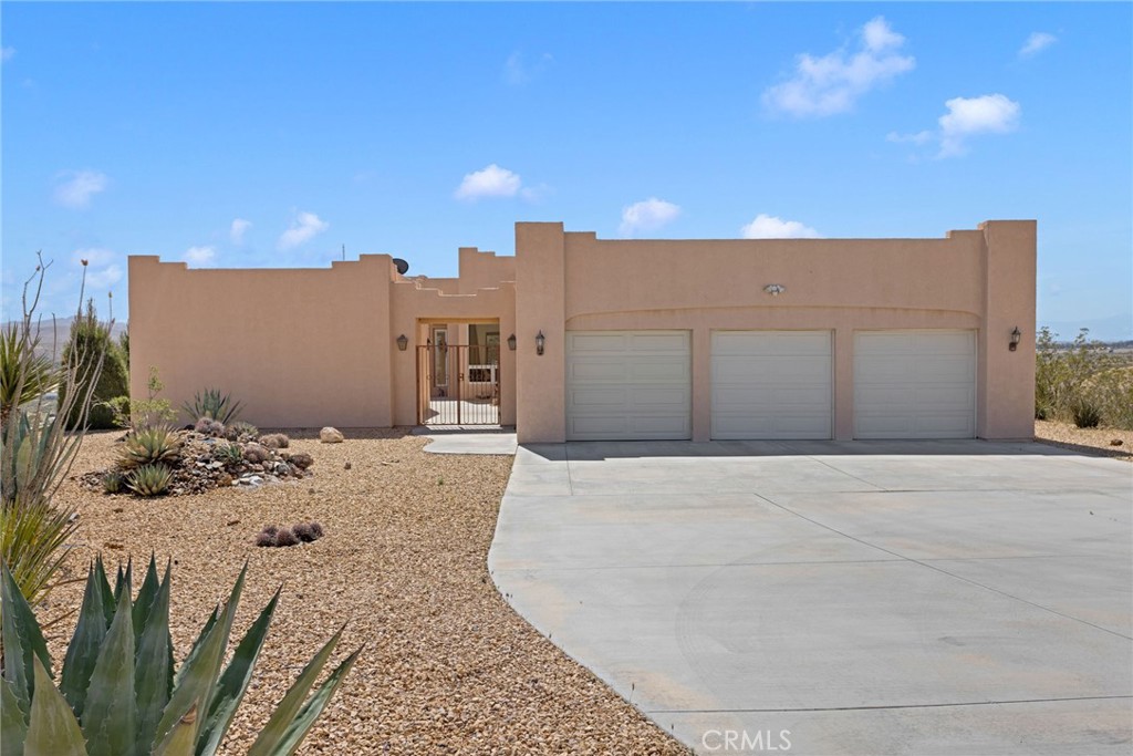 16222 Wild Road Helendale, CA 92342 - Photo 1 of 75 a view of a backyard