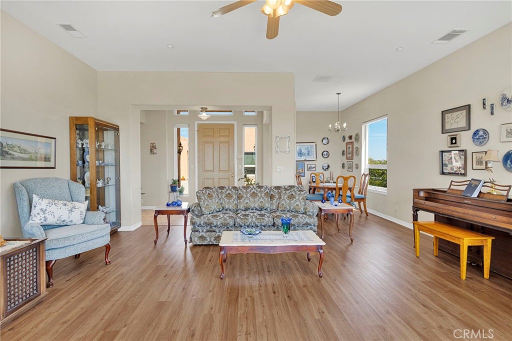 16222 Wild Road Helendale, CA 92342 - Photo 11 of 75 a living room with furniture and a wooden floor