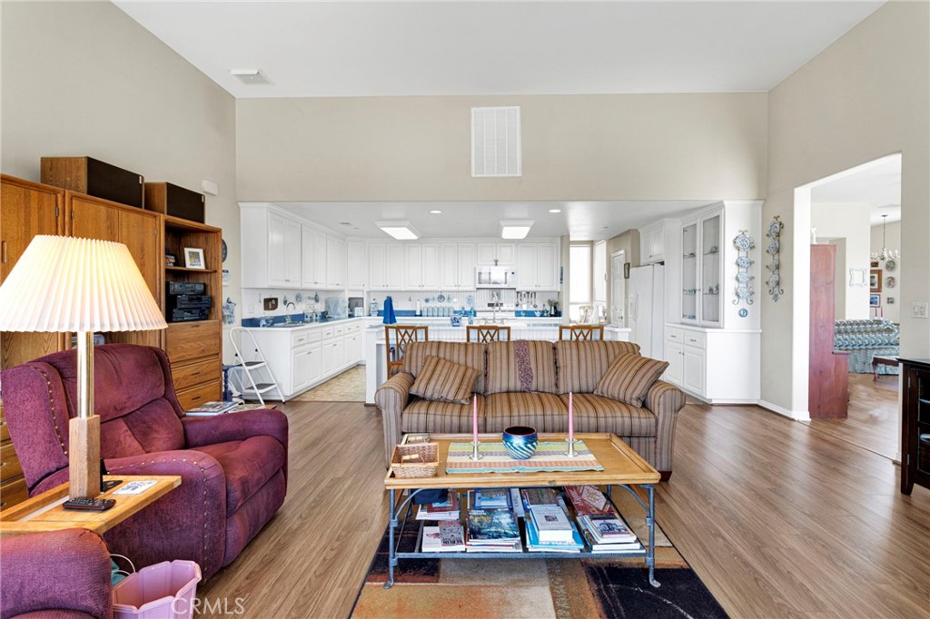 16222 Wild Road Helendale, CA 92342 - Photo 21 of 75 a living room with furniture and a wooden floor