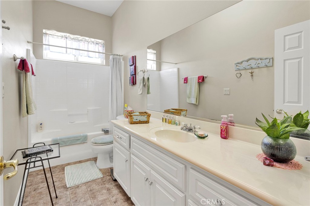 16222 Wild Road Helendale, CA 92342 - Photo 26 of 75 a bathroom with a sink a vanity and a mirror