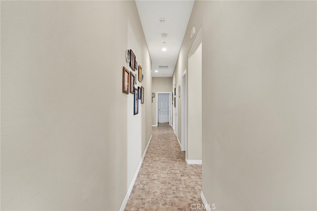 16222 Wild Road Helendale, CA 92342 - Photo 40 of 75 a view of a hallway with wooden floor