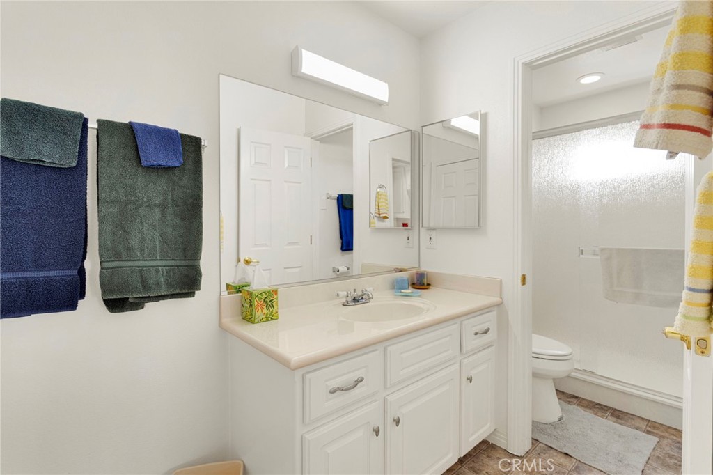 16222 Wild Road Helendale, CA 92342 - Photo 47 of 75 a bathroom with a sink a toilet and shower