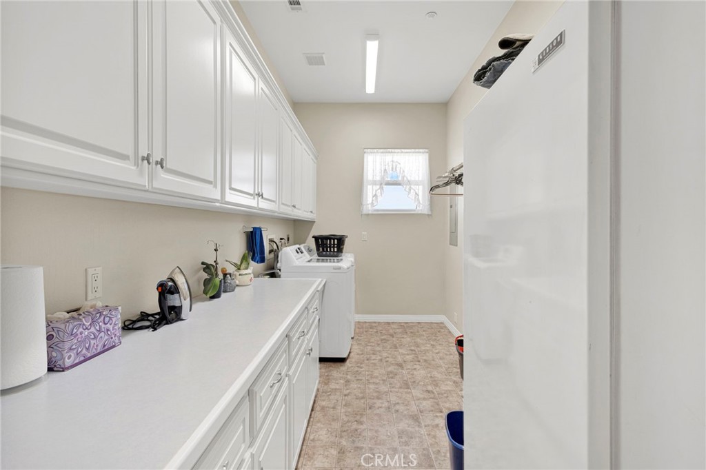 16222 Wild Road Helendale, CA 92342 - Photo 48 of 75 a kitchen with a sink and cabinets
