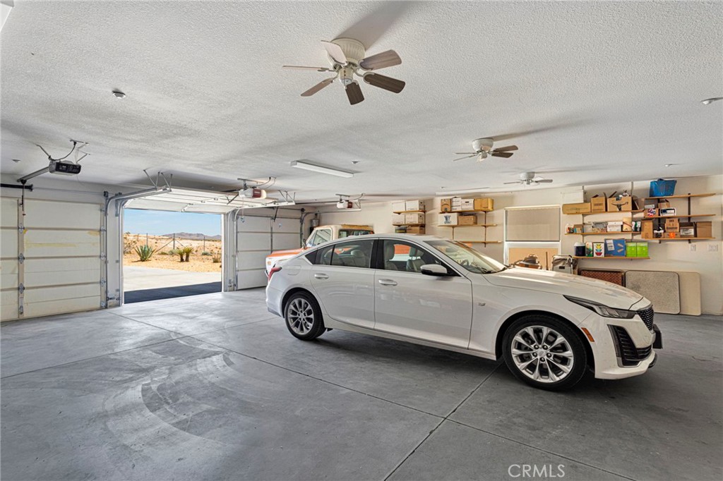 16222 Wild Road Helendale, CA 92342 - Photo 50 of 75 a car parked in a garage