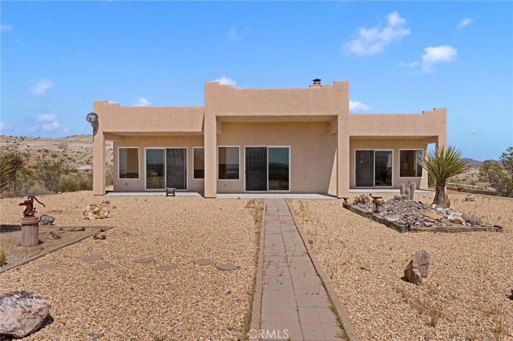 16222 Wild Road Helendale, CA 92342 - Photo 52 of 75 a view of a house with a yard