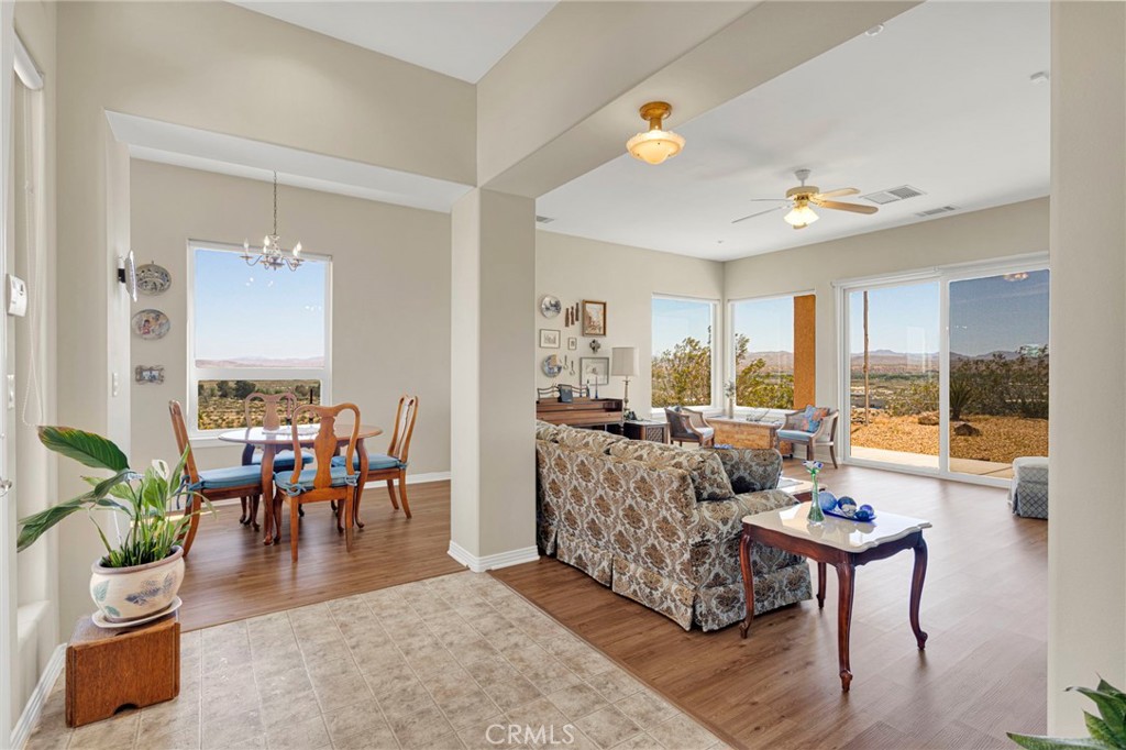 16222 Wild Road Helendale, CA 92342 - Photo 7 of 75 a living room with furniture and a large window
