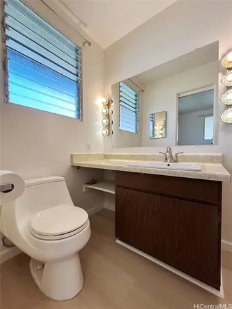 a bathroom with a sink and a toilet