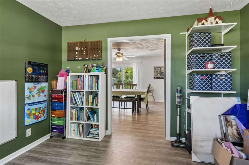 795 Tanner Road Dacula, GA 30019 - Photo 28 of 47 a view of a workspace with furniture and toys