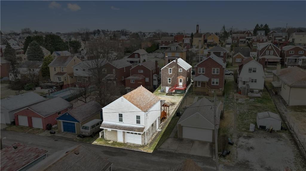 230 West Marigold Street Homestead, PA 15120 - Photo 2 of 50 an aerial view of a house with a yard