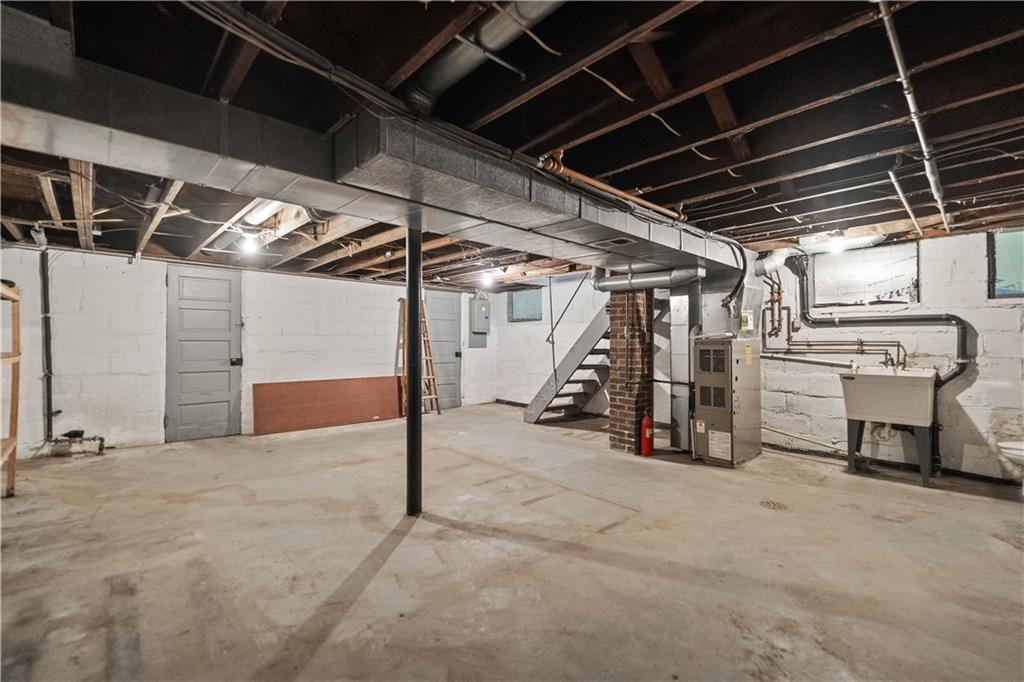 230 West Marigold Street Homestead, PA 15120 - Photo 21 of 50 a view of an empty room with storage