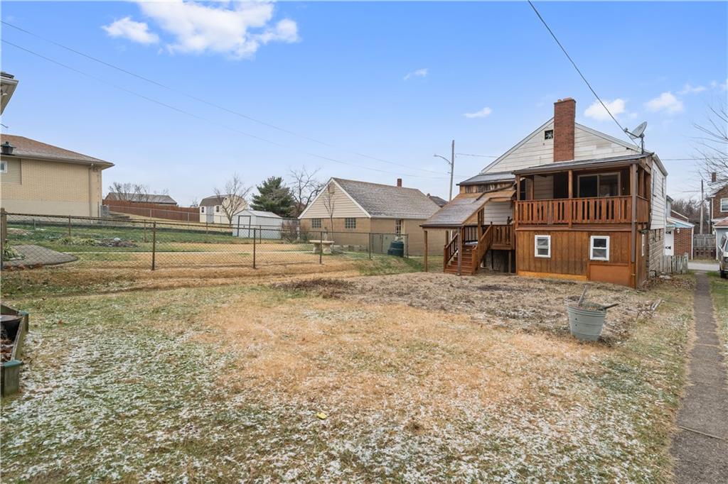 230 West Marigold Street Homestead, PA 15120 - Photo 23 of 50 a front view of a house with a yard